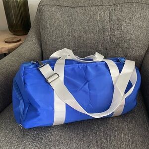 Halara Blue Duffel Bag with White Straps